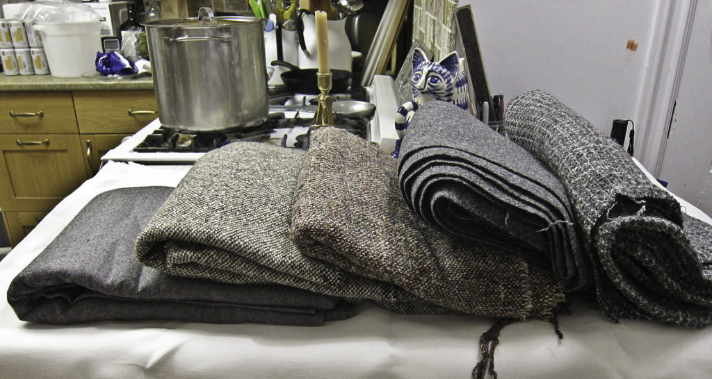 Five tweeds, mostly greys