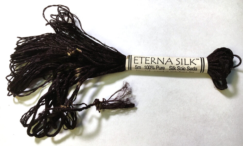 a hank of black Eterna silk embroidery thread